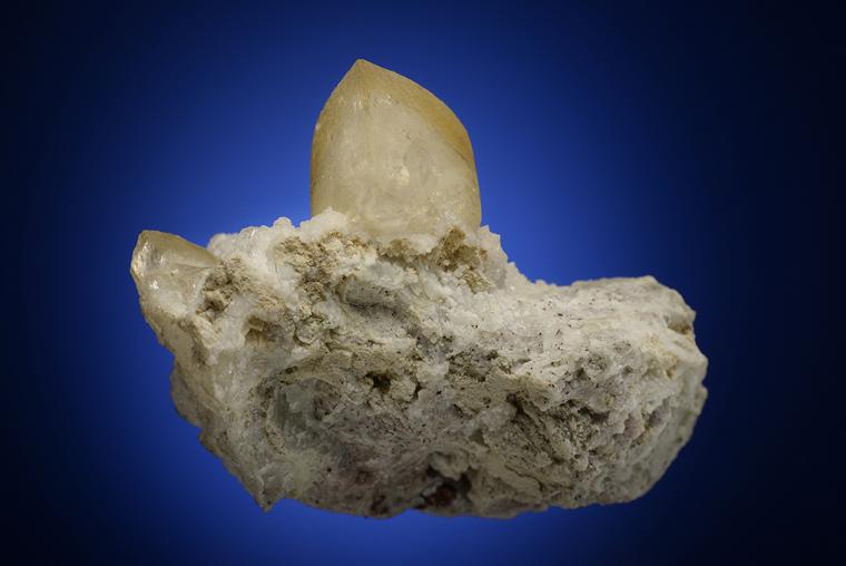 CALCITE with COPPER on ANALCIME